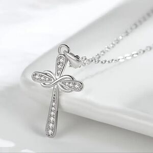 Elegant Silver Tone Infinity Cross Pendant Necklace. New